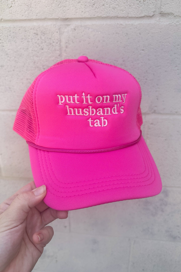 Put It On My Husbands Tab Trucker Hat