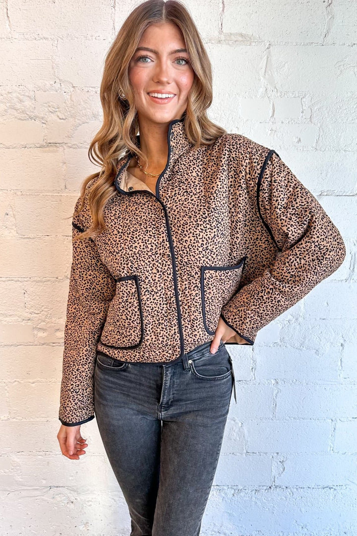 Bold animal print for a trendy statement
Quilted design for warmth and comfort
Neutral tan color for versatile styling
Ideal for casual or dressed-up looks