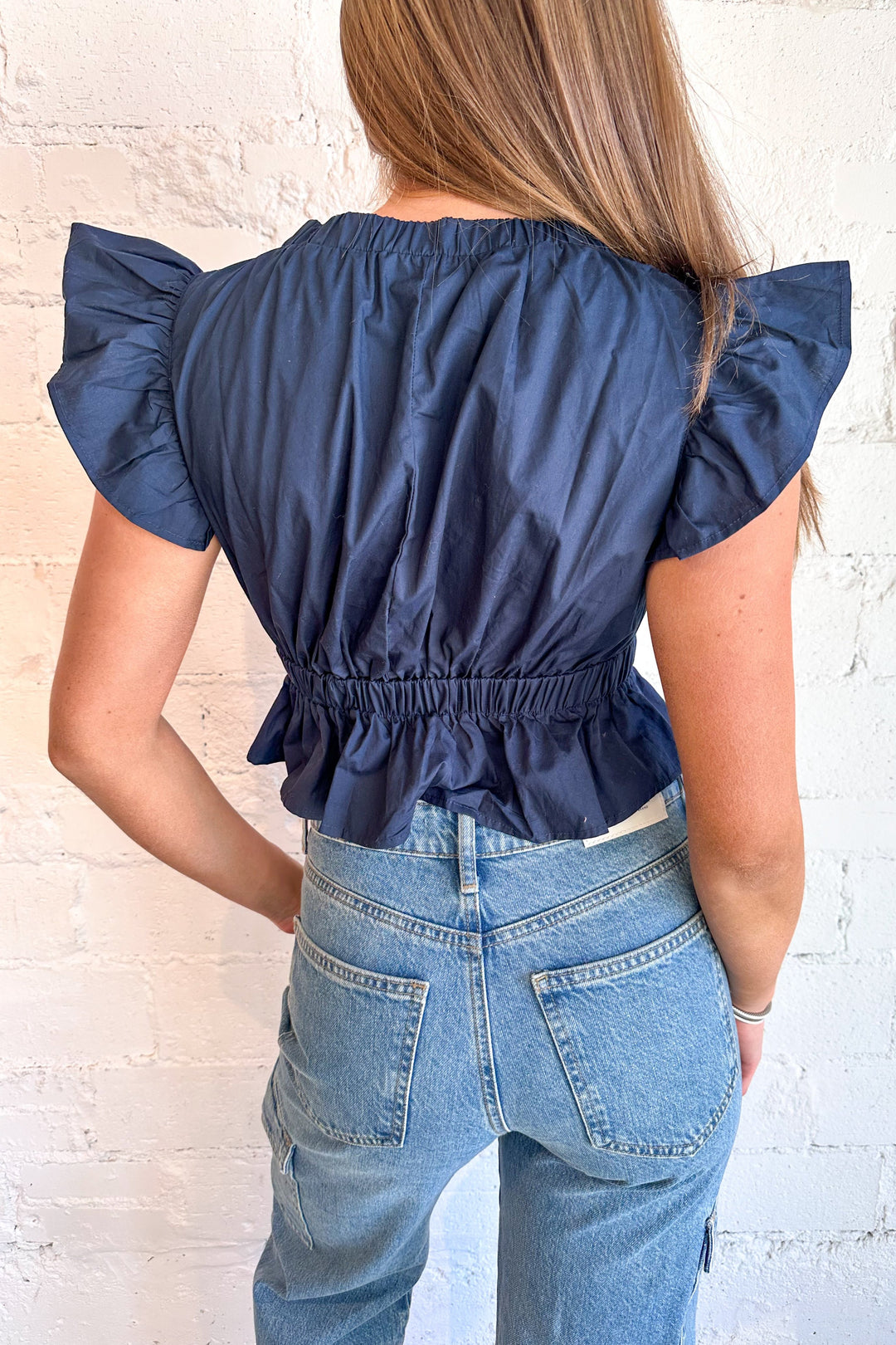 Blue bow front top, bow top, gameday top, womens boutique dallas, dallas boutique 