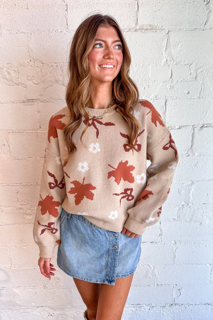 Delicate bow details for a feminine touch
Soft, lightweight knit fabric for all-day comfort
Relaxed fit in a neutral beige color for versatile styling
Ideal for casual outings, layering, or cool-weather wear
