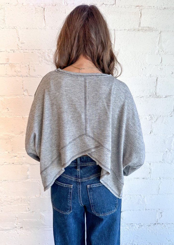 Soft knit fabric for ultimate comfort
Relaxed fit for a casual, easygoing silhouette
Versatile grey color that complements any wardrobe
Ideal for layering or wearing solo
