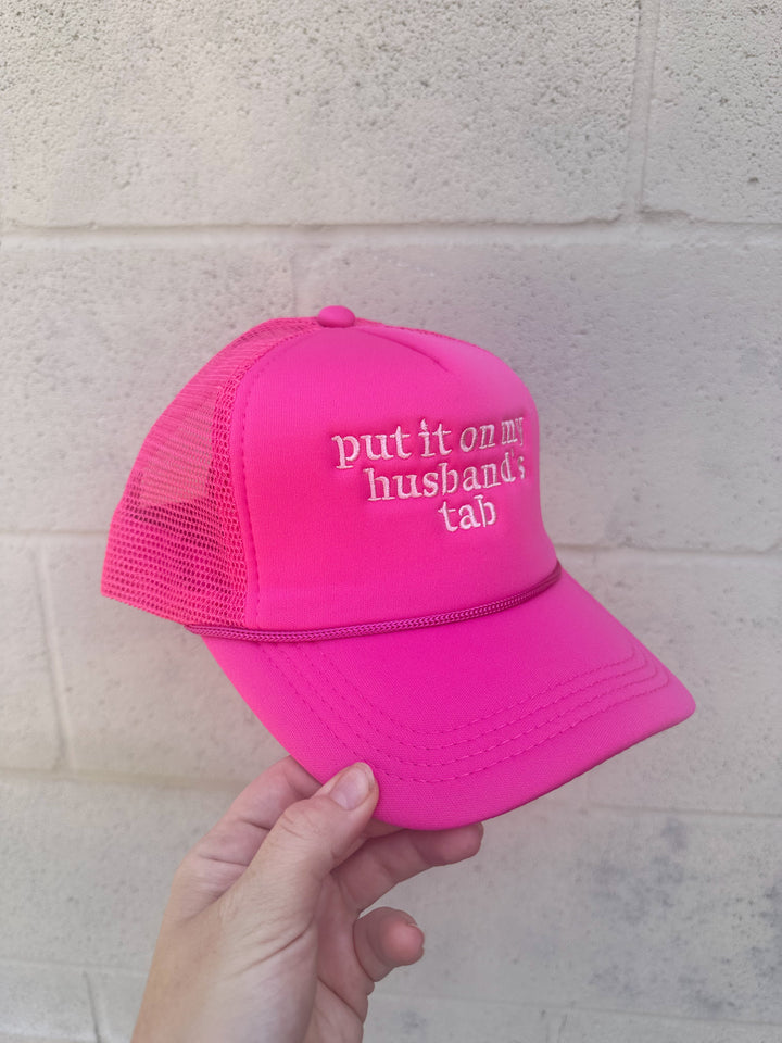 Put It On My Husbands Tab Trucker Hat