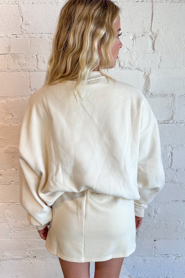 A-line silhouette for a flattering fit
Soft cream color for versatile styling
Easy-to-wear mini length
Perfect for casual outings or dressed-up occasions